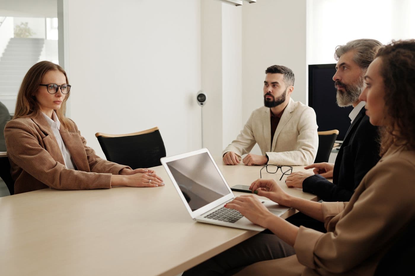 Gate Insight colleagues collaborating around a meeting table