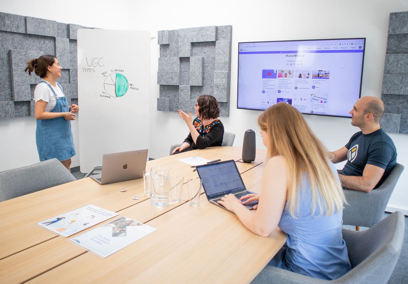 Project team reviewing a presentation together